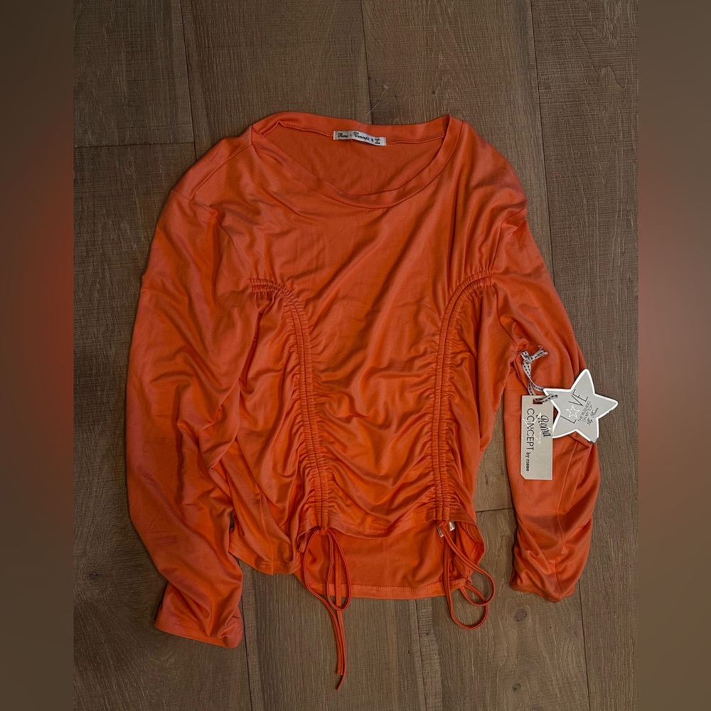 Stylish Orange Blouse by Romeo & Juliet Couture